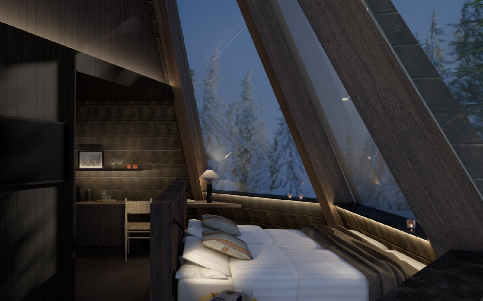 A comfortable bed is positioned beneath the sloping glass windows of the Aurora Kota's at Nivunki Village in Finnish Lapland for perfect views of the northern night sky