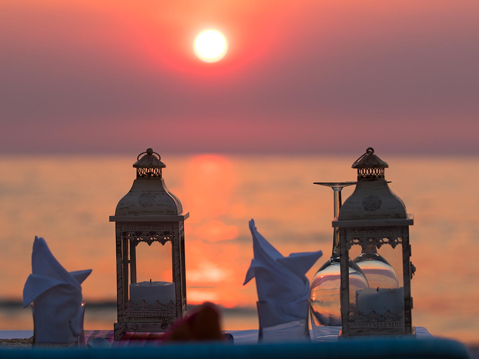 Dining table set on the beach at Kaya Mawa, Likoma Island, Lake Malawi; photograph by Wildlife & Wilderness