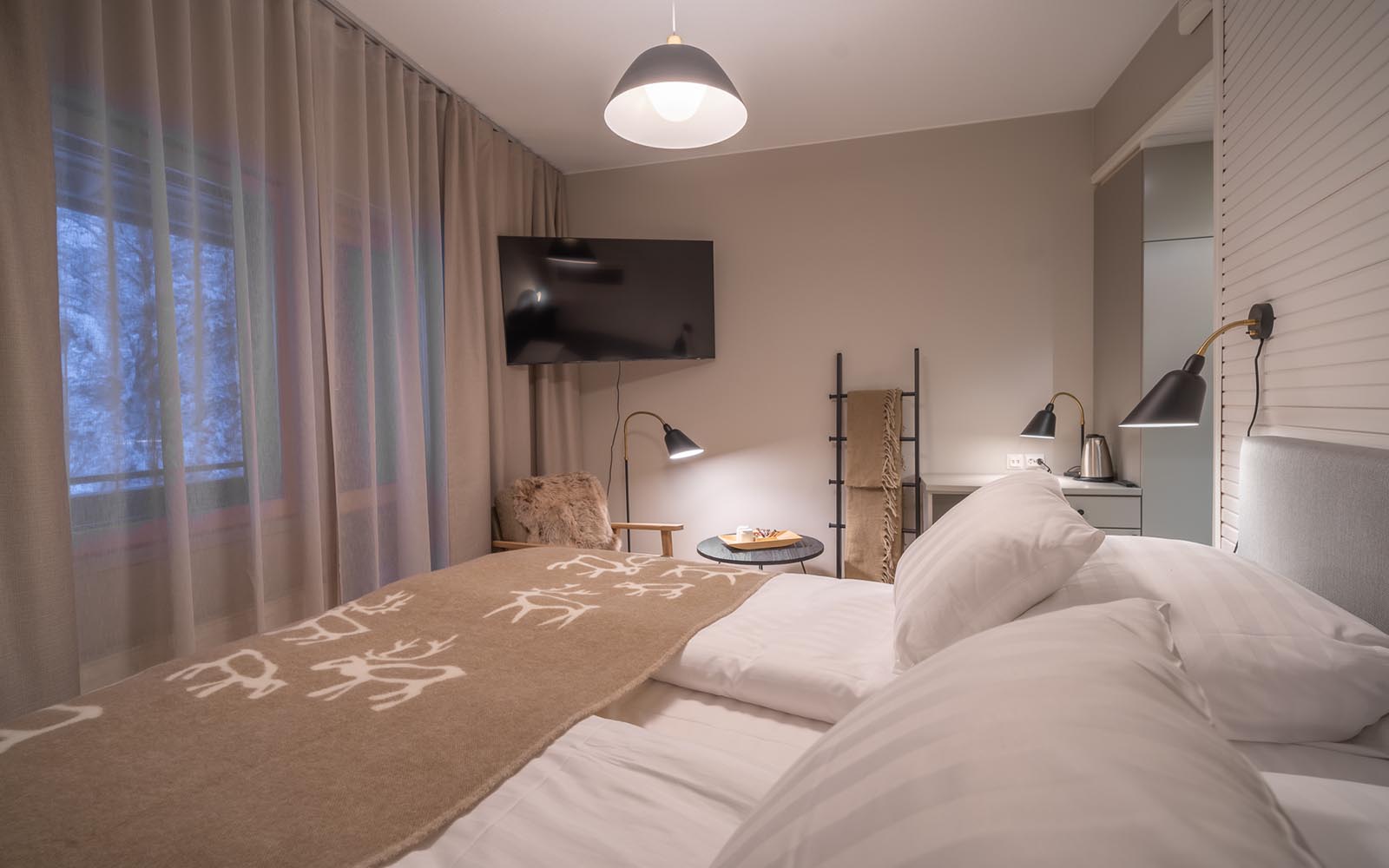 Decorated in natural tones the Superior Sauna Room (formerly Juutua Suite) boasts a patio or balcony and it&#x27;s own private sauna