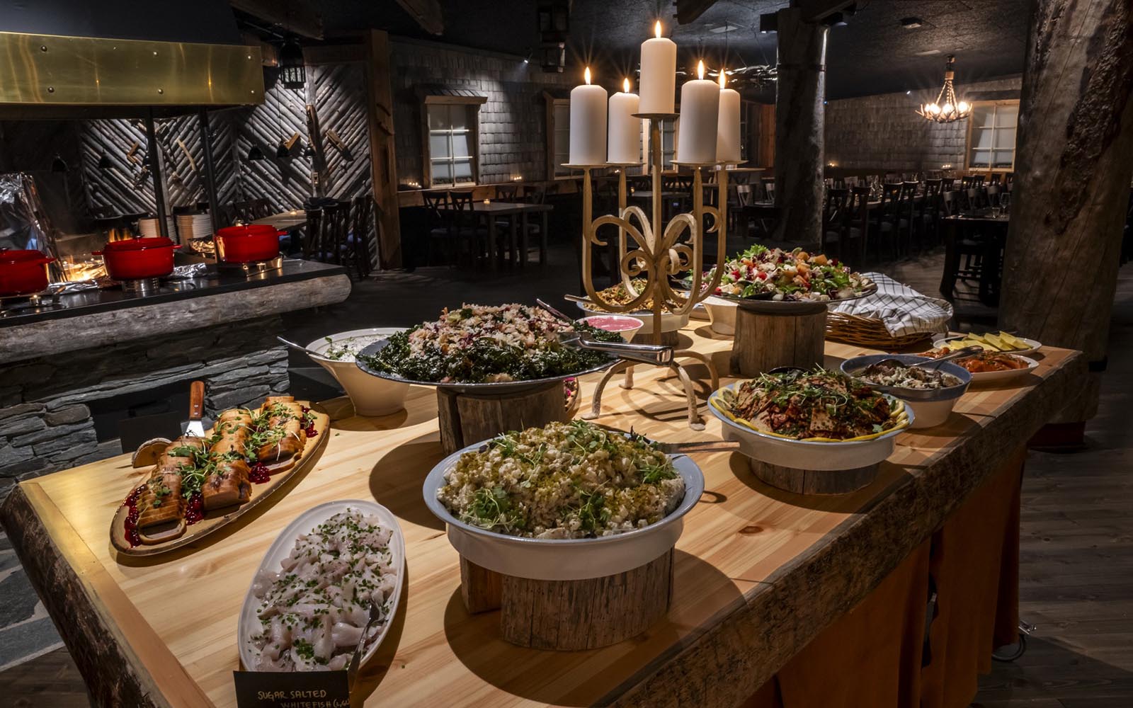 The buffet table displays a colourful selection of tasty looking Finnish dishes at Kontioluola restaurant in Iisakki Village, Finnish Lapland. 