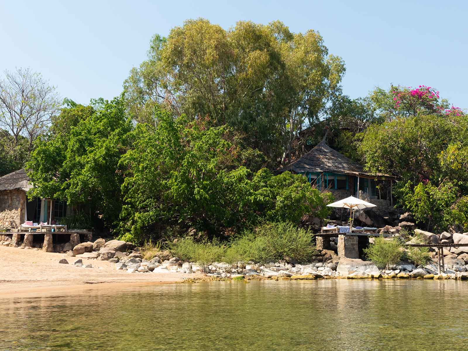 View of cottages on the beach at Kaya Mawa, Likoma Island, Lake Malawi; photograph by Wildlife & Wilderness