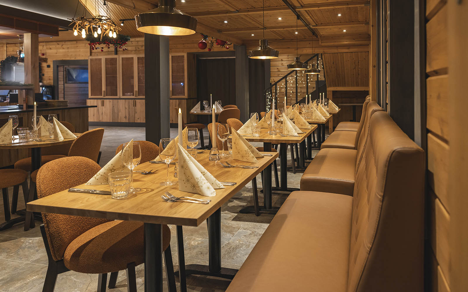 The tables are set for dinner in the restaurant at Harriniva Adventure Resort near Muonio in Finnish Lapland 