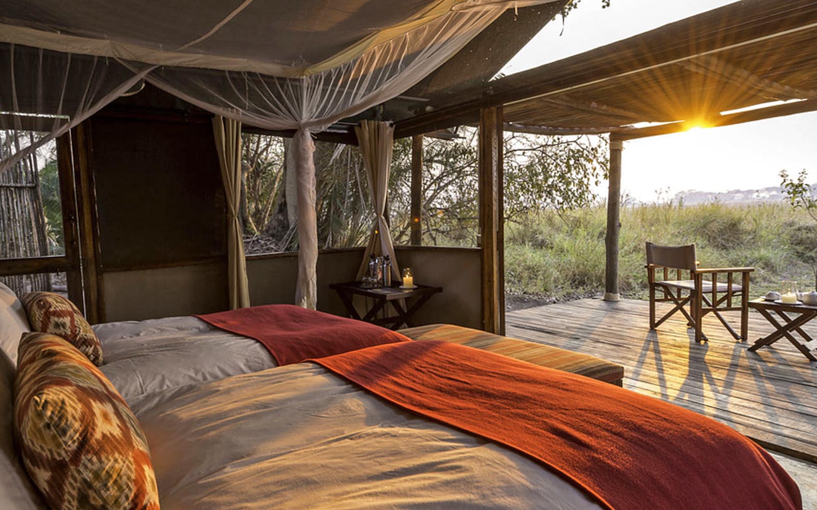 Sunrise in one of the tented bedrooms at Busanga Bush Camp, Kafue, Zambia
